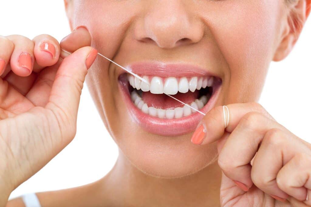 Floss Your Teeth A Simple Way To Good Dental Health Harris Dental